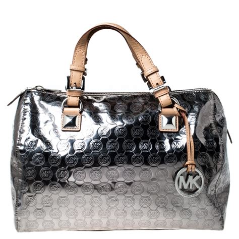 michael kors black bag with silver hardware|Michael Kors metallic silver handbags.